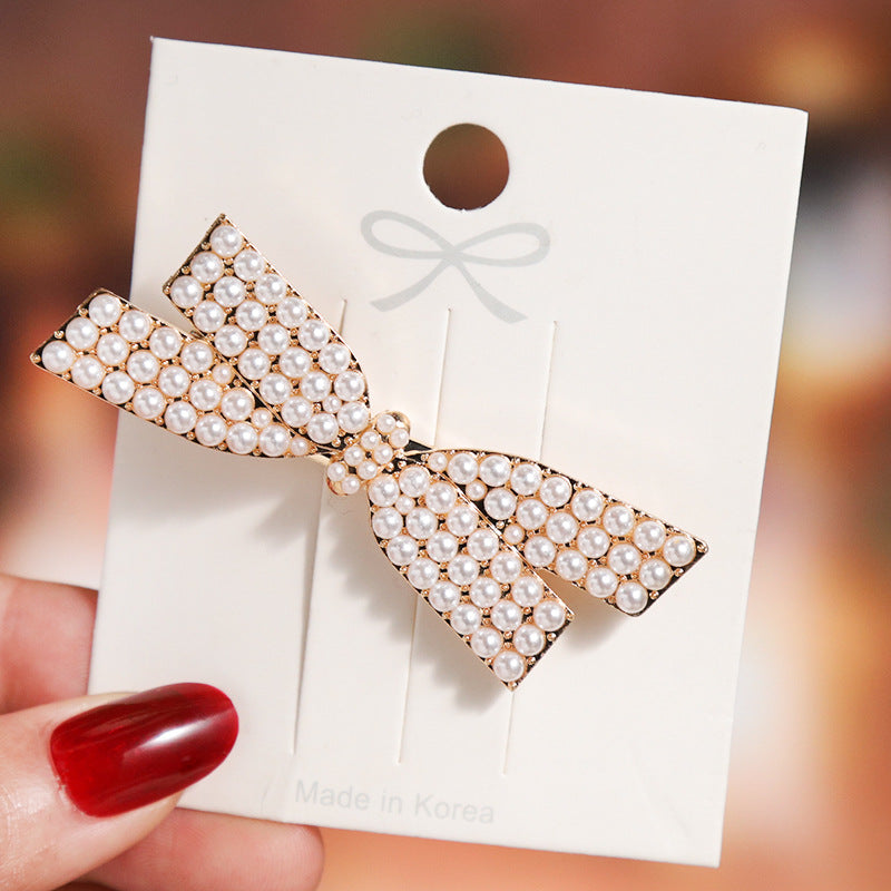 Wholesale Diamond Inlaid Snowflake Bow Hair Clips
